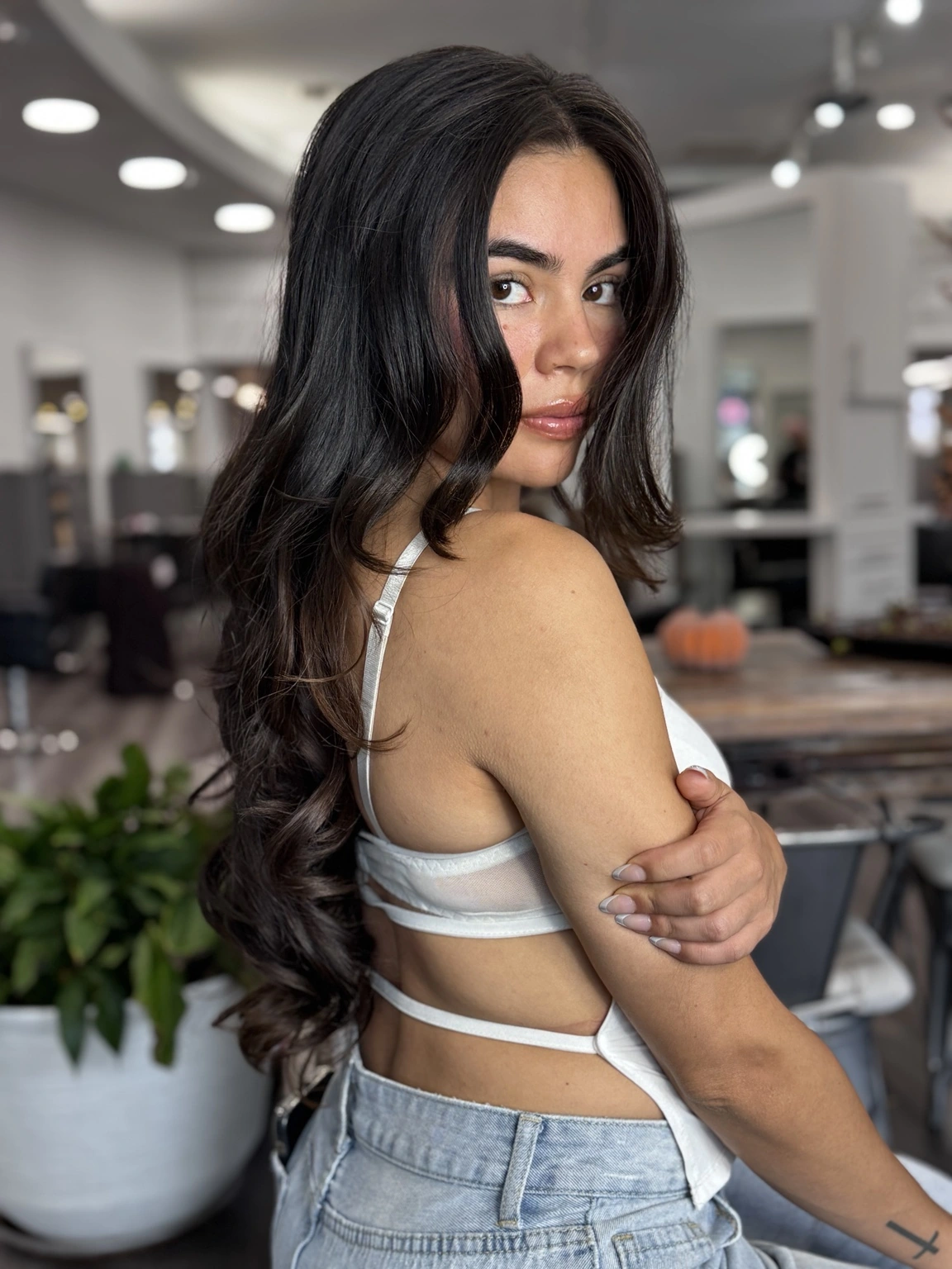 Glossy dark brunette hair by Hair by Irmz